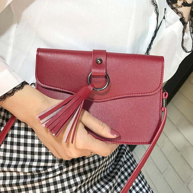 QUEEN'S TASSEL LEATHER CROSSBODY PURSE
